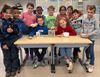 Pelt - Tassetschoolkinderen doneren voor de Warmste Week