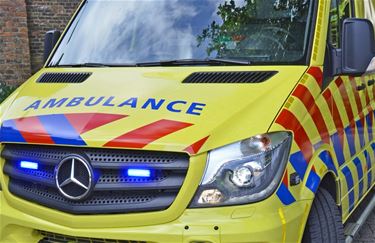 Auto gekanteld na botsing in Wijchmaal - Peer