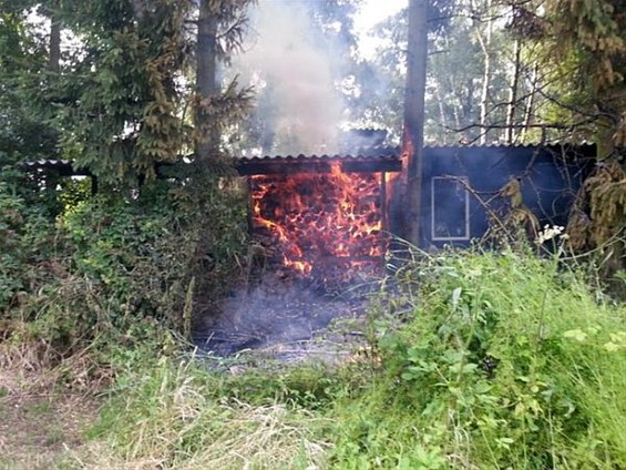 Houtstapel uitgebrand - Neerpelt