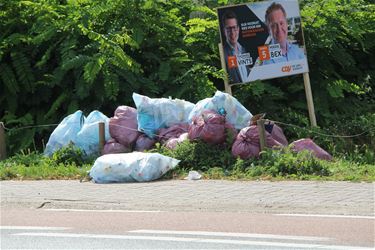 Huisvuil zomaar op straat - Beringen