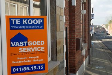 Vastgoed: huis duurder, flat goedkoper