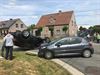 Beringen - Auto over de kop in Paal