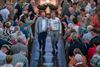 Lommel - Bomvolle kerk voor Peter en Koen