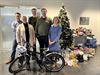 Lommel - Werknemers ZF Wind Power verzamelen speelgoed