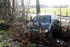 Overpelt - Auto van de weg in hagelbui