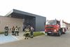 Beringen - Brandweer staat voor gesloten deur