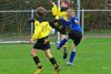 Jonge voetballers aan het feest