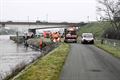 Vuilniszakken met afval van wietplantage in kanaal