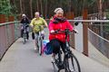 Okra Koersel fietst door de bomen