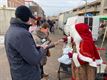 Kerstman bezoekt markt in Paal
