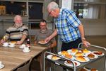 Taart en BBQ bij Okra Werkplaatsen