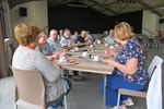 Taart en BBQ bij Okra Werkplaatsen