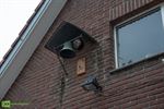 Wat met het beeld en de bel aan de school?